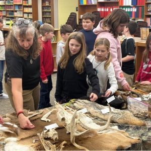 Benjamin Logan Environmental Science Club Explores Microscopic Life and Wildlife Populations
